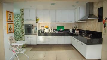 Fridge, stovetop, cookware/dishes/utensils