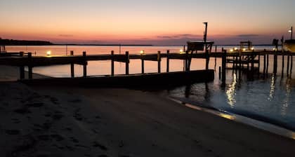 Room on river with sunset views and private beach!