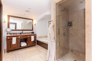 Bathtub, hair dryer, towels, soap