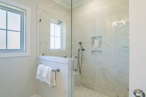 Combined shower/tub, hair dryer, towels, soap