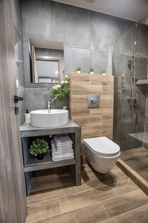 Shower, rainfall showerhead, free toiletries, hair dryer. Raise Averof Serviced Apartments