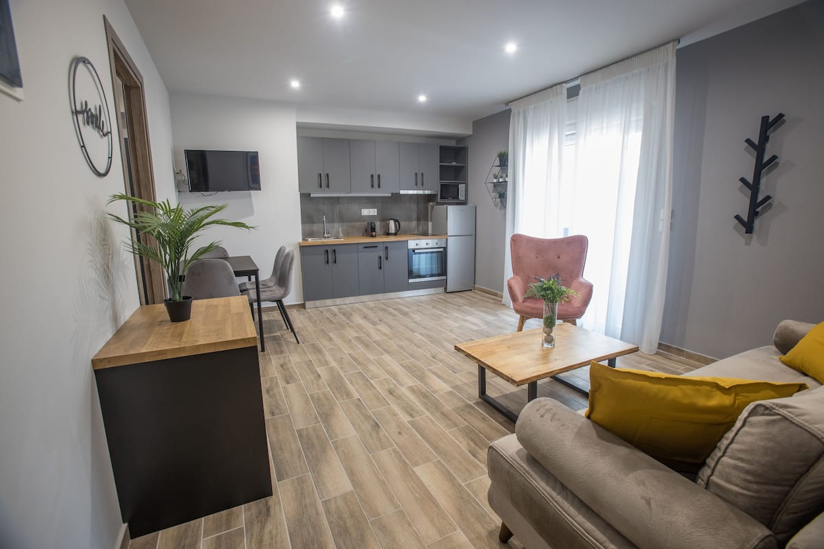Family Apartment | Living area | 32-inch Smart TV with digital channels, TV