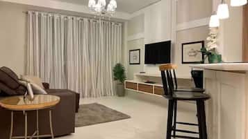 Chambre Double Design | Coin séjour