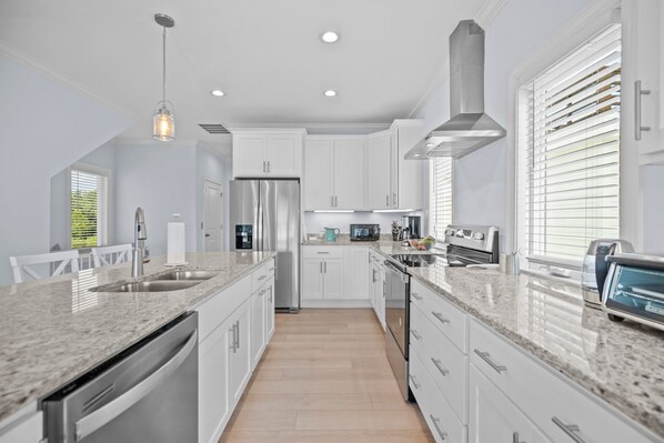 Fridge, microwave, oven, stovetop - Modern Single Family Home 5 minute walk to the Beach! Linens Included! (Carolina Beach)