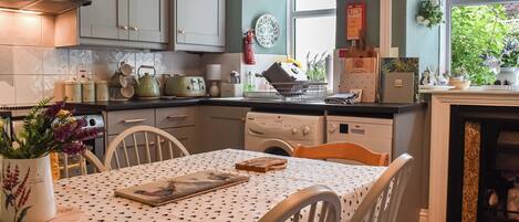 Dishwasher, high chair, cookware/dishes/utensils