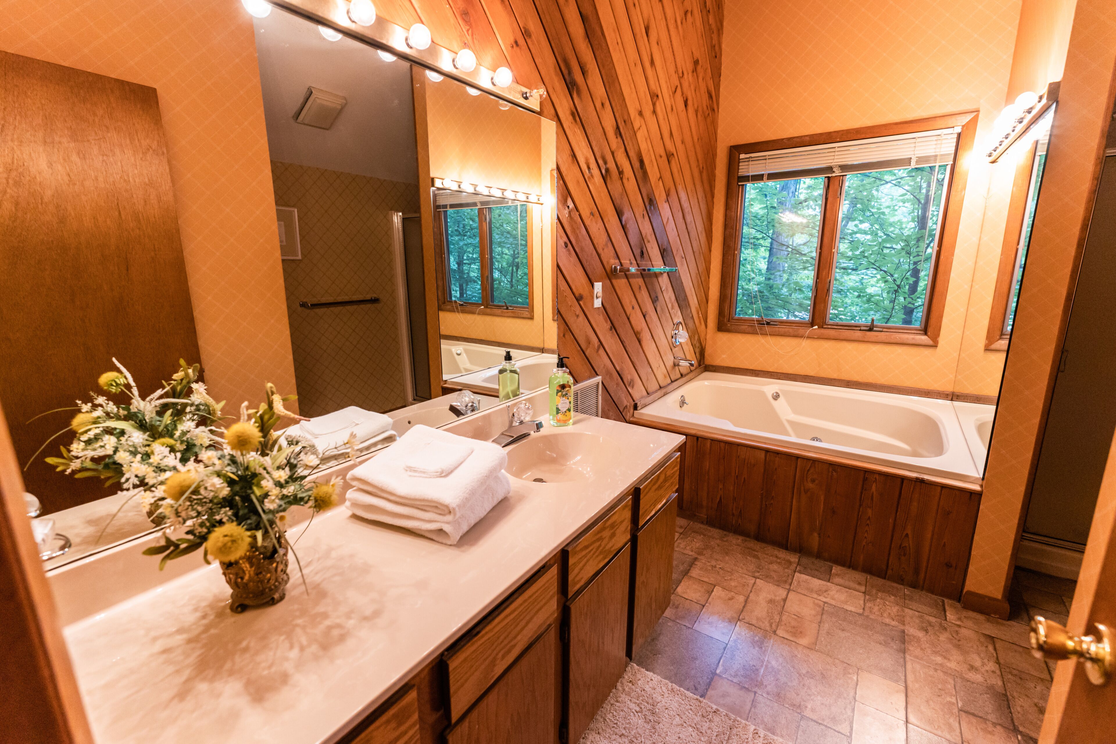 Bathtub, jetted tub, towels, soap