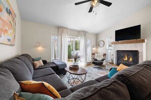 Smart TV, fireplace, table football, books