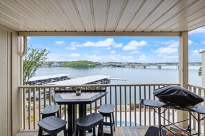Outdoor dining - Parkside Paradise - Waterfront Condo w/ Lake & Pool Views! (Osage Beach)