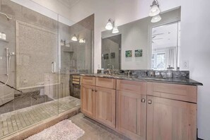 Shower, hair dryer, towels, shampoo