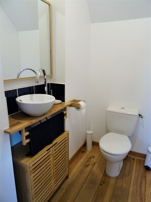 Bathtub, hair dryer, towels, soap