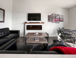 Smart TV, fireplace, Netflix, books