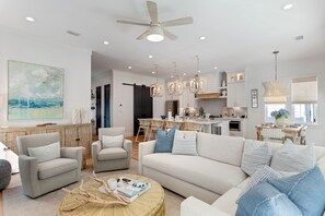 Smart TV, fireplace, books, smart speakers