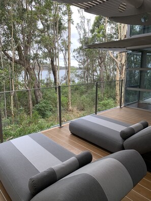 Property grounds - Absolute beachfront Designer house with spa (Maloneys Beach)