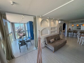 Basic Apartment | Living area | 32-inch Smart TV with digital channels, TV