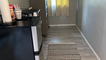Fridge, microwave, coffee/tea maker, dining tables