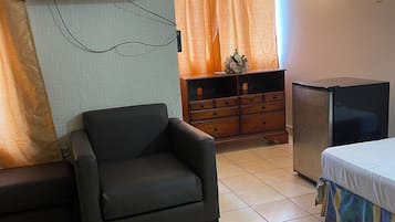 Comfort Room | Iron/ironing board, bed sheets