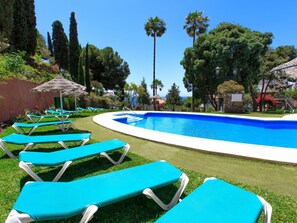 Water, Plant, Sky, Swimming Pool, Tree, Building, Azure, Shade, Outdoor Furniture, Umbrella