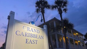 A sign for the Grand Caribbean East hotel with a number 3291.