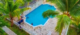 Villa Sol Apartments in Punta cana with Panoramic View Pool lights at Night