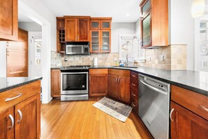 Coffee/tea maker, fridge, microwave, oven - Brookside 3BR Home - Garage Parking + Pets! (Kansas City)