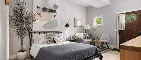 1 bedroom, desk, iron/ironing board, travel crib