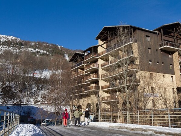 Guests can enjoy stunning views from the balconies of this traditional building.