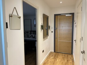 Departamento | 1 habitación, tabla de planchar con plancha, wifi gratis y ropa de cama