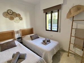 2 slaapkamers, een strijkplank/strijkijzer, gratis wifi, beddengoed