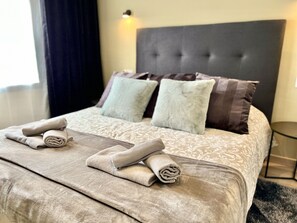 2 dormitorios, tabla de planchar con plancha, wifi gratis y ropa de cama