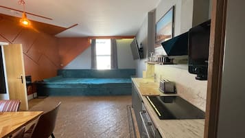 Cobertura superluxo, banheiro privativo | Cozinha compartilhada | Mesas de jantar