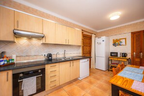 Fridge, microwave, oven, stovetop - Villa Balena with Heated Pool, Sea Views, Wi-Fi, and Air Conditioning (Sa Ràpita)