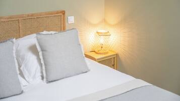 Appartement Familial, plusieurs lits | Literie de qualité supérieure, minibar, coffres-forts dans les chambres