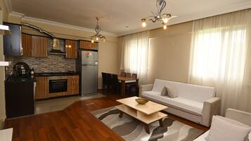 Grand Suite, Balcony, Mountain View | Desk, free cots/infant beds, bed sheets