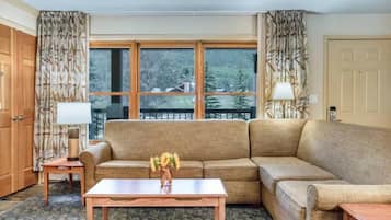 Signature Condo, 1 Bedroom | Living room | 45-inch TV with cable channels, fireplace