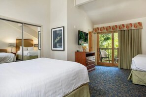 شقة ديلوكس - غرفة نوم واحدة | منطقة المعيشة | تلفزيون بحجم 45-بوصة يعرض قنوات تلفزيونية باشتراك مدفوع، مدفأة