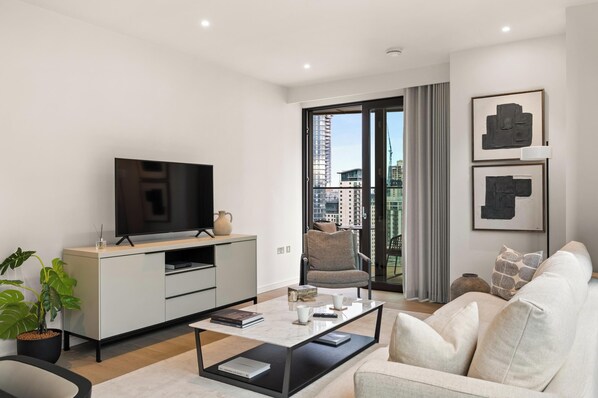 Apartment (2 Bedrooms) | Living area | 24-inch TV with digital channels