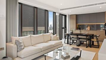 Apartment (2 Bedrooms) | Living area | 24-inch TV with digital channels