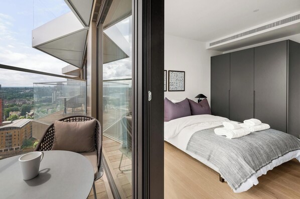 2 bedrooms, premium bedding, desk, laptop workspace