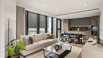Apartment (2 Bedrooms) | Living area | 24-inch TV with digital channels