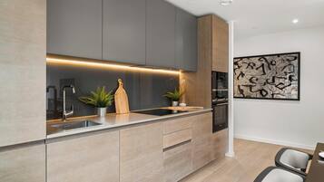 Apartment (2 Bedrooms) | Private kitchen | Fridge, microwave, stovetop, dishwasher