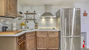 Fridge, coffee/tea maker, toaster, cookware/dishes/utensils
