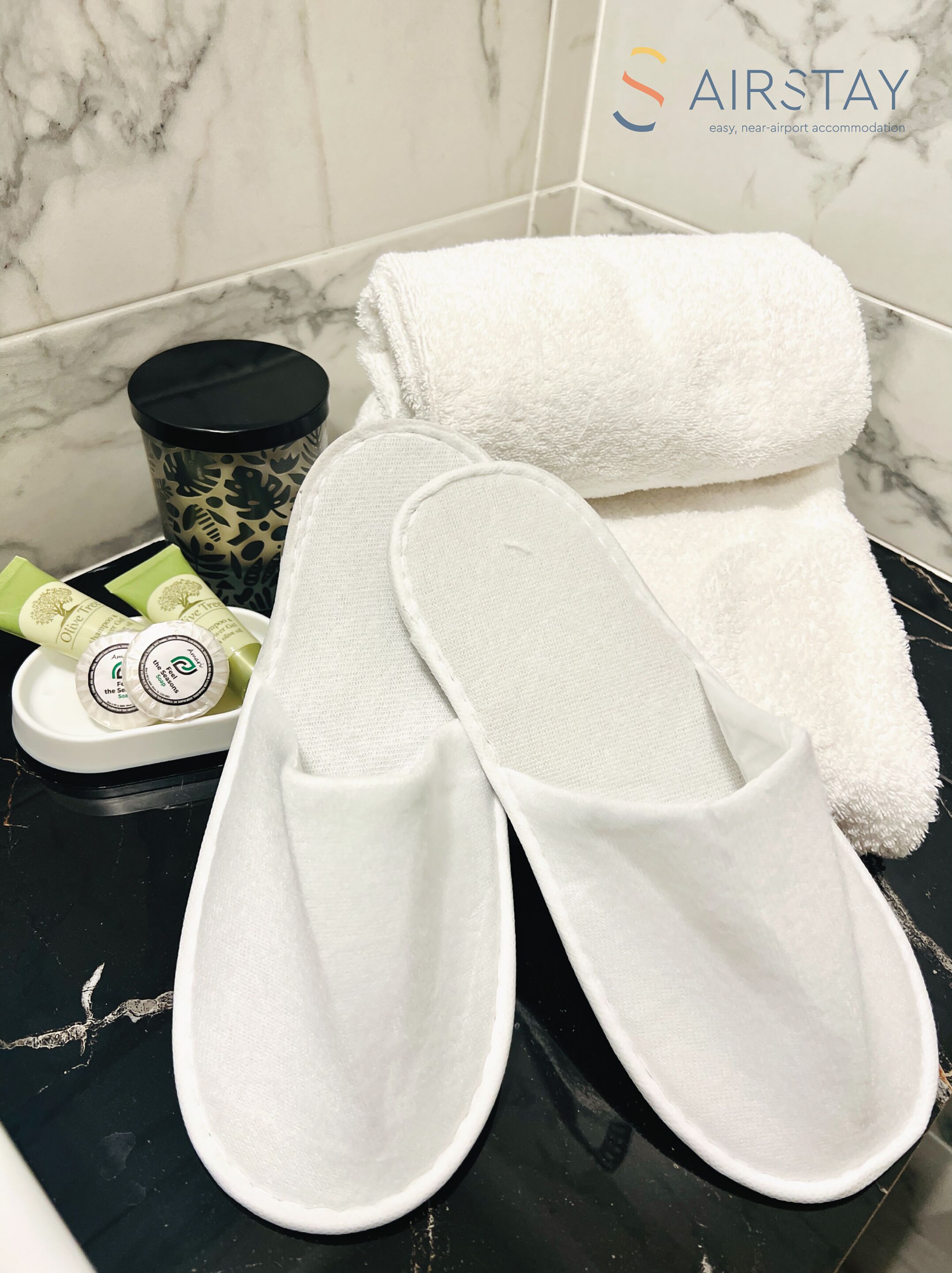 shower, rainfall showerhead, hair dryer, towels