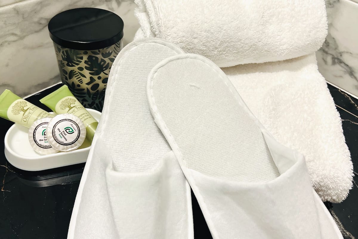 shower, rainfall showerhead, hair dryer, towels