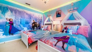 A bedroom with two beds, a mural of animated characters, and a canopy bed. - Last Minute Disney! Private Pool, Hot Tub, Game Room & Themed Bedrooms. Book Now! #36422 (Orlando)