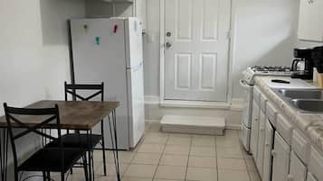 Comfort Apartment | Private kitchen | Full-size fridge, oven, stovetop, coffee/tea maker