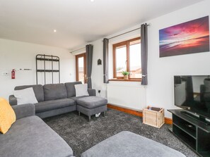 Living area - Delphine Lodge, Meadow View Lodges (Burnham-on-Sea)