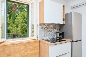 Refrigerador, horno, placa de cocina, lavavajillas