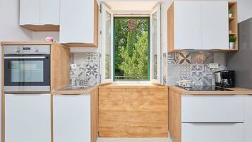 Apartment (1 Bedroom) | Private kitchen | Fridge, oven, stovetop, dishwasher