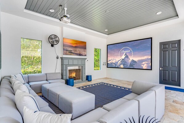 TV, fireplace, video games, foosball - The One at Reunion | Luxe 12BR Mansion w/ Private Pool, Theater, Gym, and Arcade Near Disney (Kissimmee)