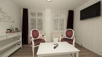 Comfort Double Room | Living area | 22-inch flat-screen TV with satellite channels, TV
